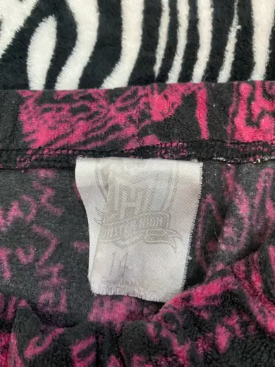 Pantalones estampados negros y rosados para niña - miniatura 4
