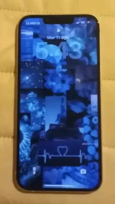 iPhone 13 Mini en buen estado - miniatura 1