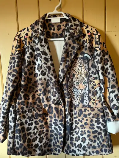 Chaqueta estampado leopardo con diseño de estrella - miniatura 1