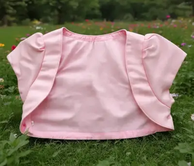 Bolero rosa para niña con volantes - miniatura 1