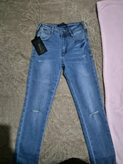 Jeans de mujer azul con cierre en tobillo - miniatura 1