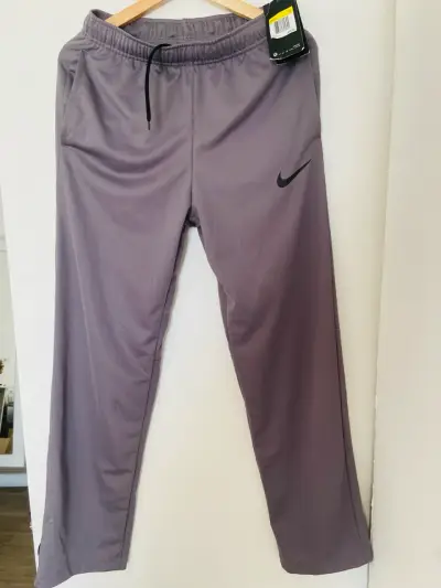 Pantalones deportivos Nike Dri-FIT grises - miniatura 1