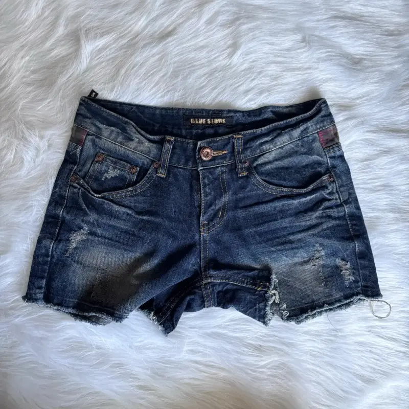 Shorts de mezclilla Blue Stone desgastados