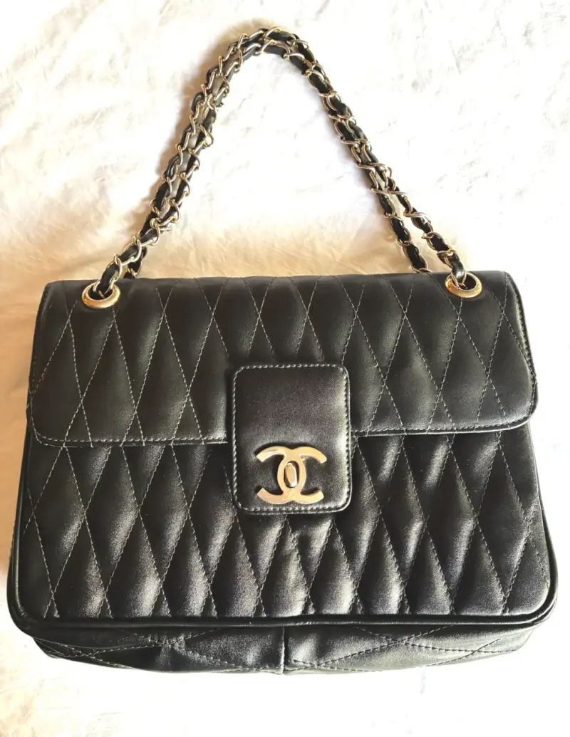 Cartera de cuero negra, genérica. Fab. Argentina - 1