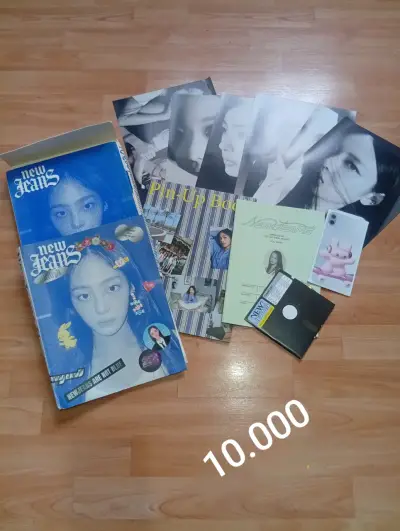 Colección de álbumes y fotos de New Jeans - miniatura 1
