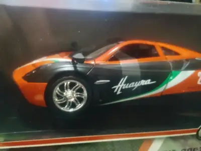Modelos de autos a escala Huayra y Fórmula 1 - miniatura 1