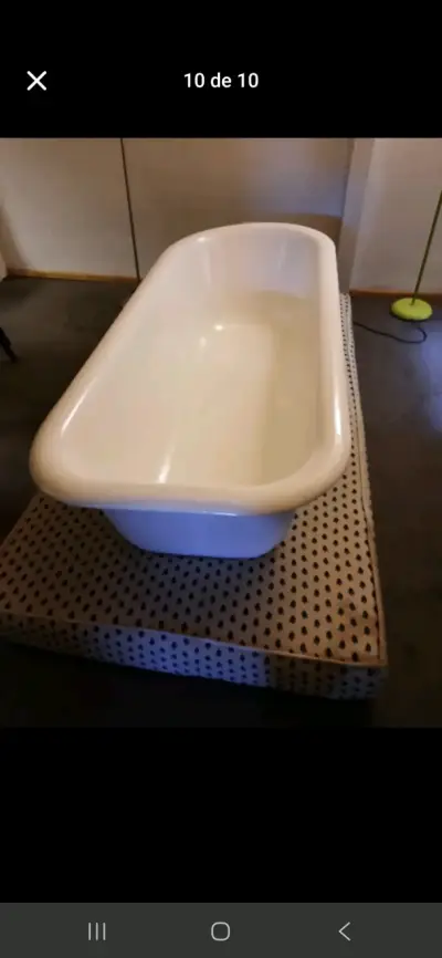 Bañera antigua de fierro fundido. - miniatura 1