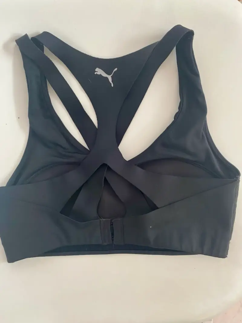 Top deportivo negro Puma con tirantes cruzados - 3