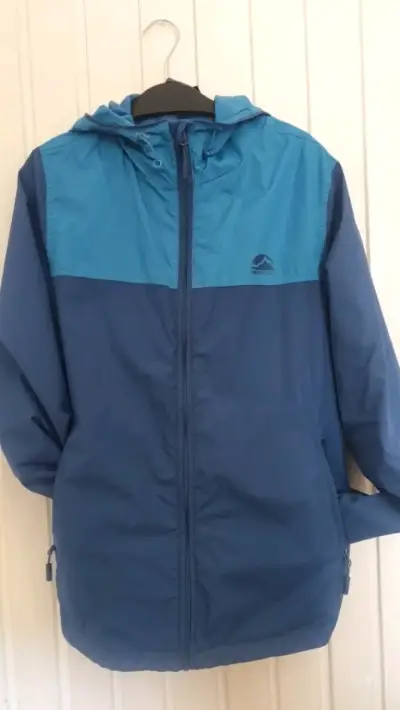 Corta viento repelente al agua azul para hombre - miniatura 1