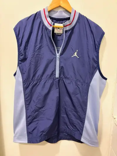 Corta viento  sin mangas Jordan azul con logo - miniatura 1