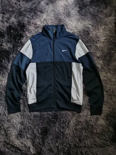 Chaqueta deportiva Nike azul y blanca - miniatura 1