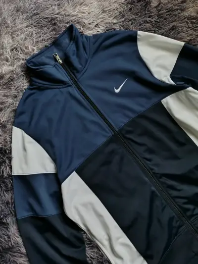 Chaqueta deportiva Nike azul y blanca - miniatura 3