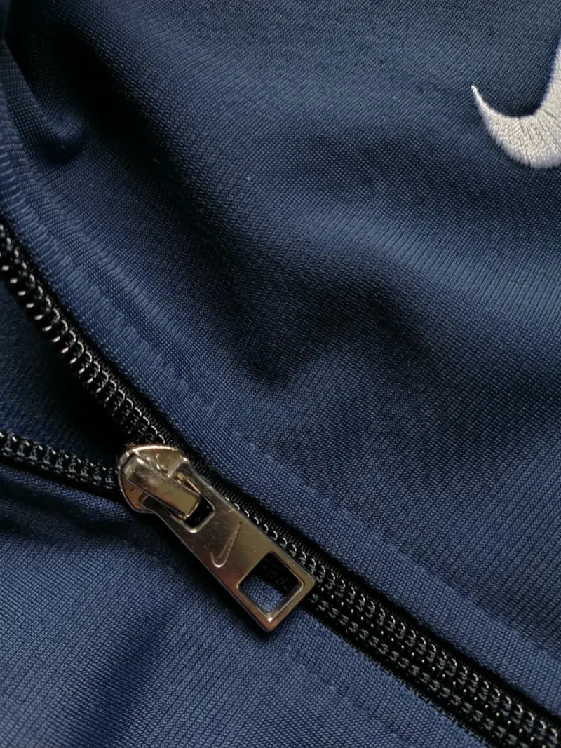 Chaqueta deportiva Nike azul y blanca - 6