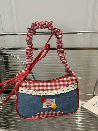 Cartera de mano vintage con diseño de cuadro - miniatura 1