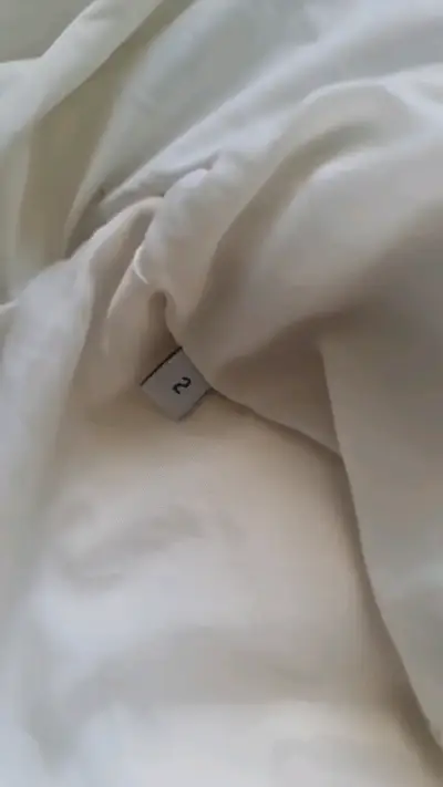 Chaqueta blanca rellena de plumas marca Moncler - miniatura 4