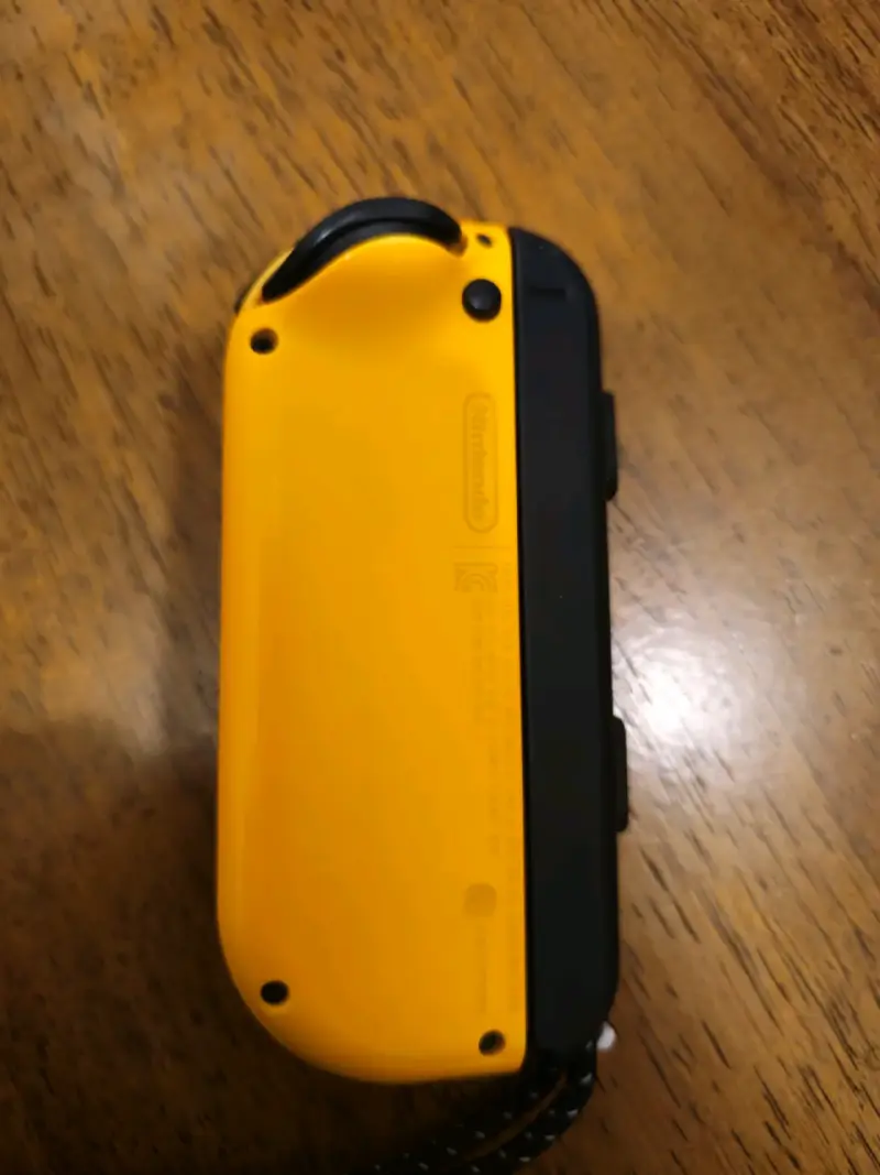 Joy-Con Nintendo Switch colores morado y amarillo - 2
