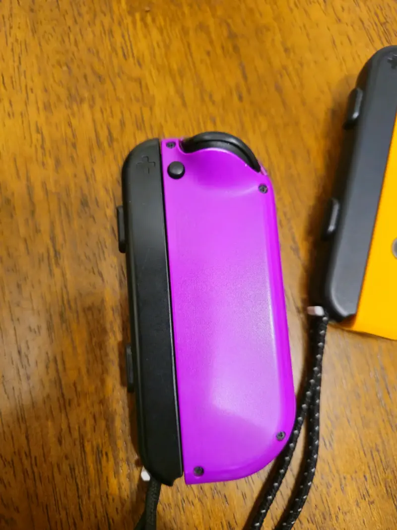 Joy-Con Nintendo Switch colores morado y amarillo - 3