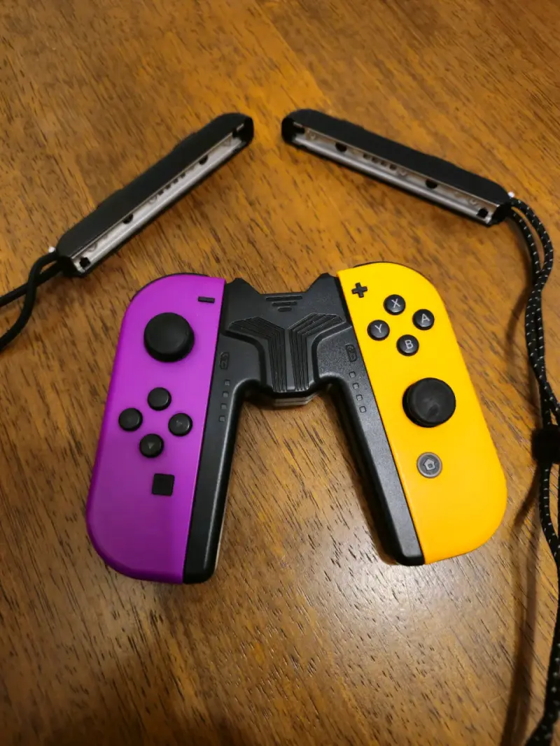 Joy-Con Nintendo Switch colores morado y amarillo - 4