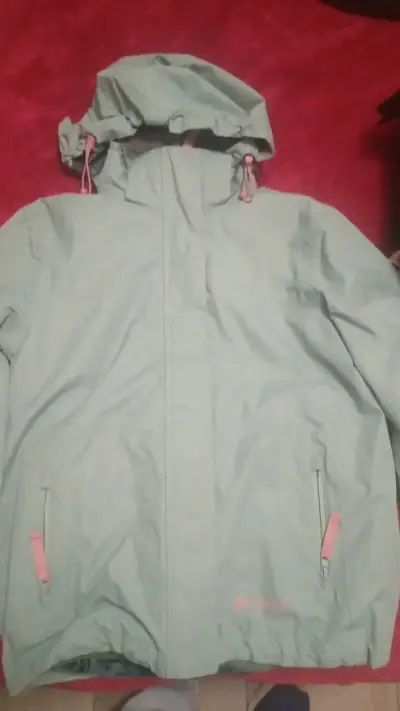 Chaqueta impermeable verde con capucha Kivul - miniatura 1