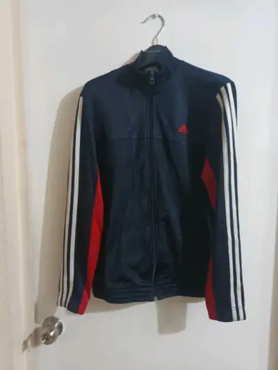 Chaqueta deportiva Adidas azul con franjas - miniatura 1