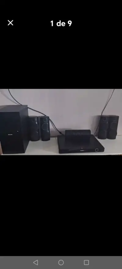 Sistema de sonido con subwoofer y parlantes. - miniatura 1