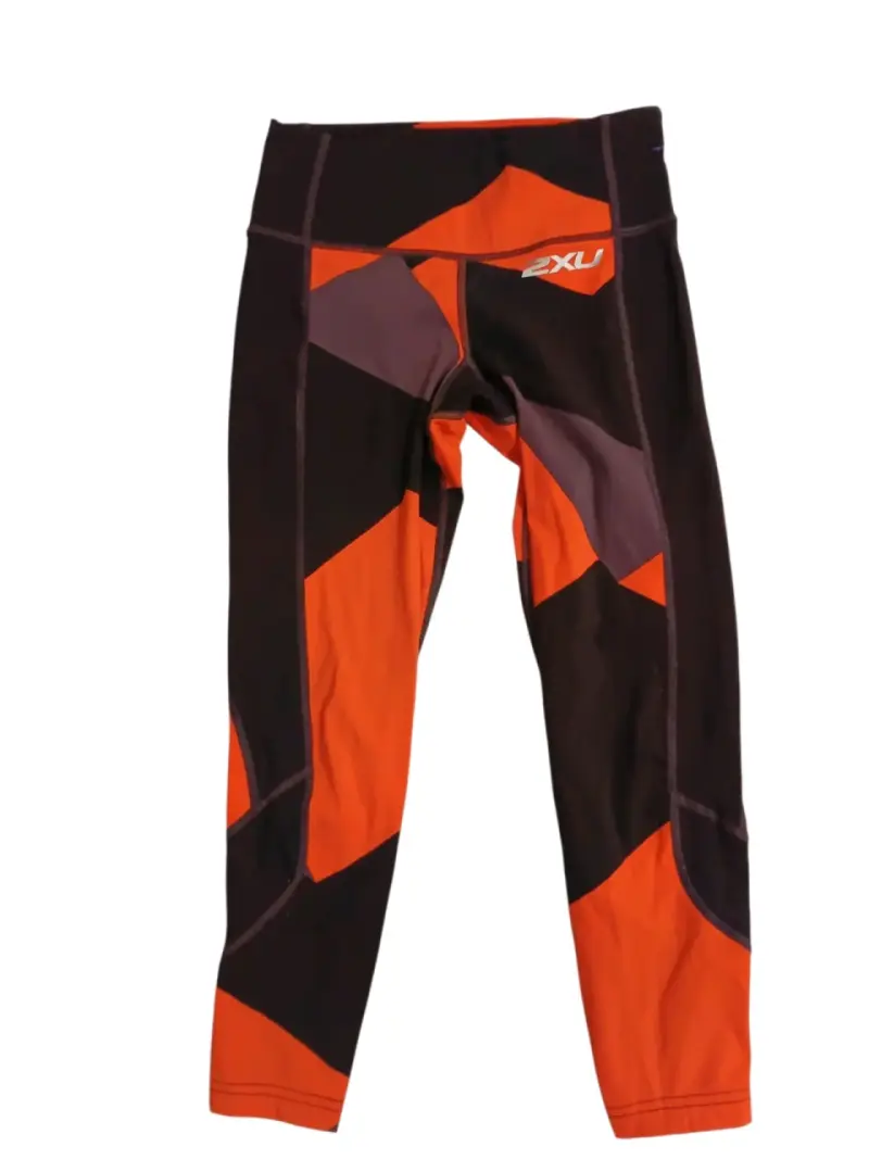 Calzas deportivas 2XU para mujer en naranja y negro