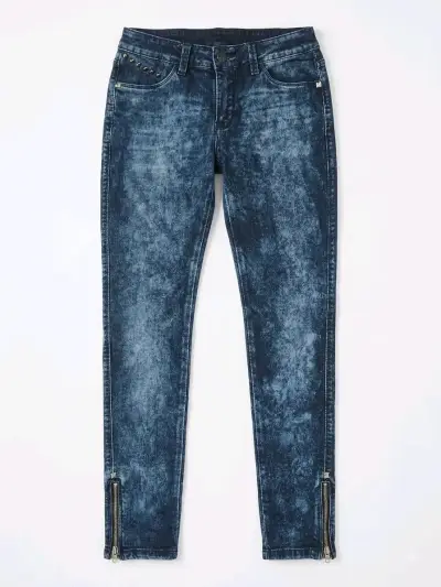 Jeans ajustados azul con cierres y tachas - miniatura 1