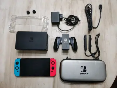 Nintendo Switch oled con accesorios - miniatura 1