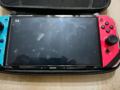 Nintendo Switch oled con accesorios - miniatura 4