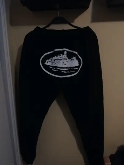 Pantalones deportivos negros con estampado - miniatura 1
