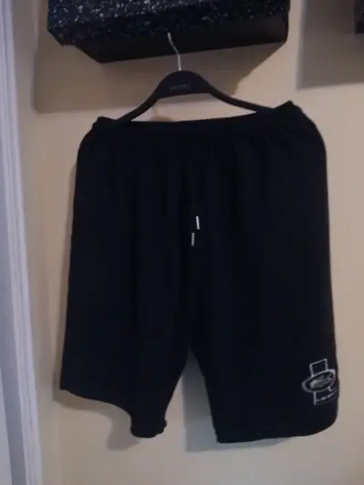 Shorts deportivos La coste negros para hombre - miniatura 1