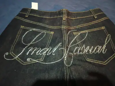 Jeans anchos con diseño casual en cristales - miniatura 1
