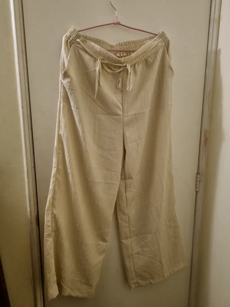 Pantalones beige de lino para mujer - 1