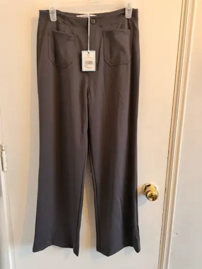 Pantalones grises de mujer con bolsillos - miniatura 1