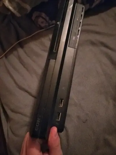 Consola PlayStation 3 Slim en buen estado - miniatura 2