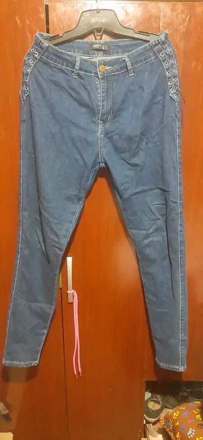 Jeans azul con ojales laterales Menina - miniatura 1