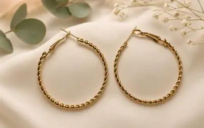 Aros de aro dorados estilo trenzado - miniatura 1