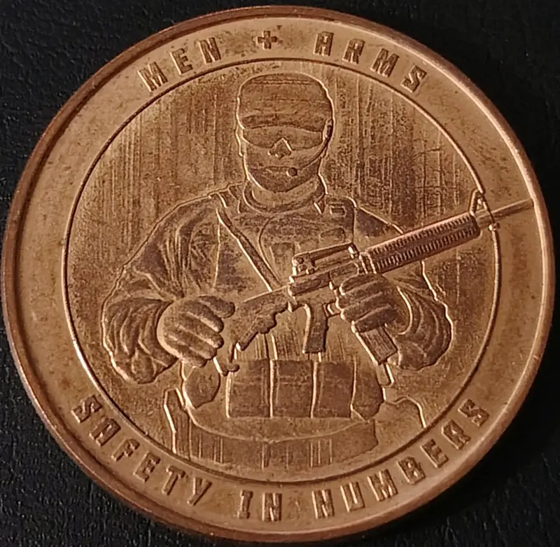 Moneda conmemorativa Men + Arms de cobre