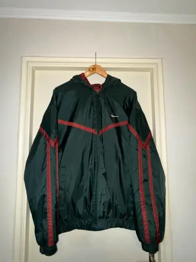 Chaqueta cortaviento verde Nike - miniatura 1