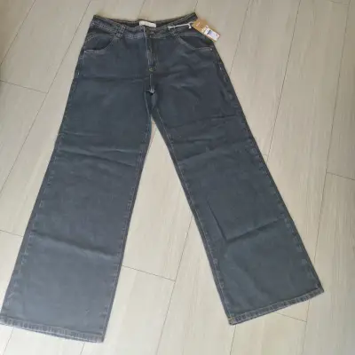 Jeans anchos de mezclilla azul para mujer - miniatura 1
