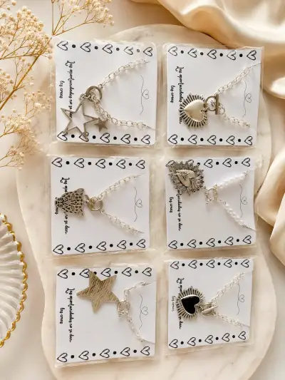 Collares de acero inoxidable con dijes variados - miniatura 1