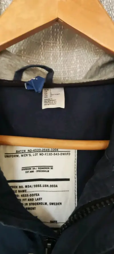 Chaqueta azul con capucha para hombre - miniatura 3
