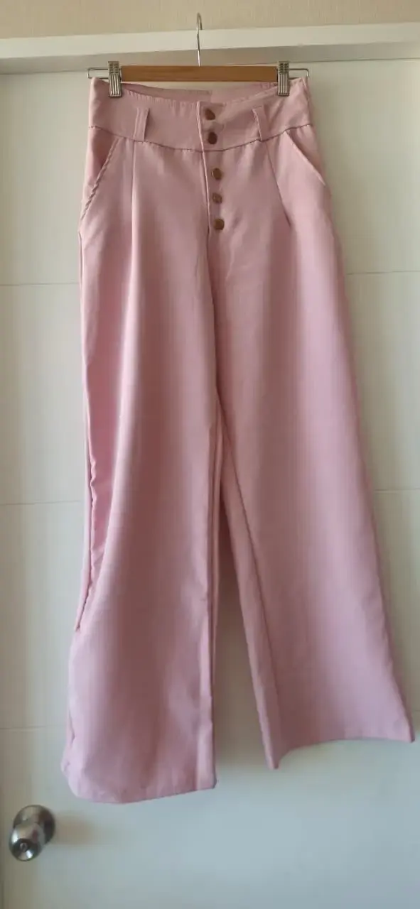 Pantalones palazzo rosados de mujer