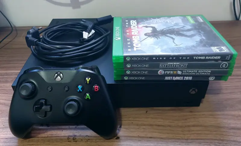 Consola Xbox One X con juegos y control - 1
