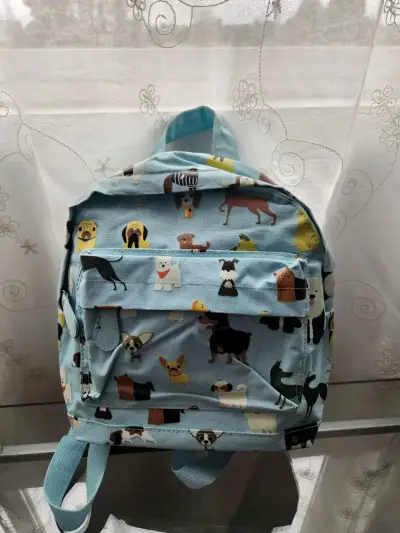 Mochila infantil azul con estampado de perros - miniatura 1