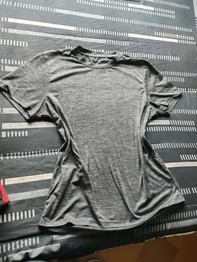 Polera deportiva gris unisex - miniatura 1