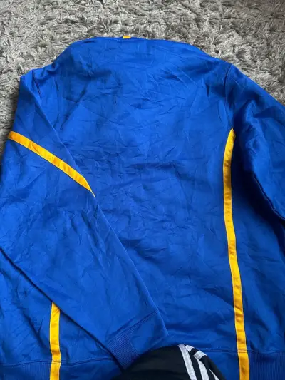Polerón con capucha azul y amarillo Under Armour - miniatura 4