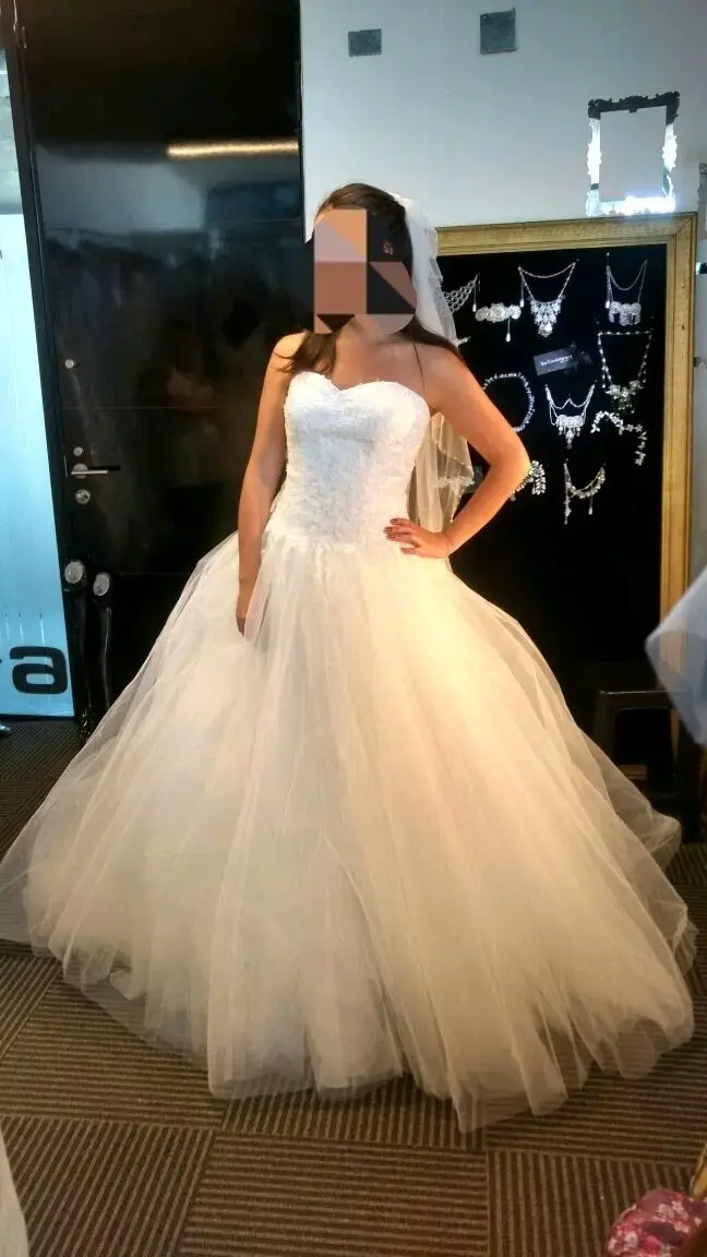 Vestido de novia blanco con encaje y tul - 1