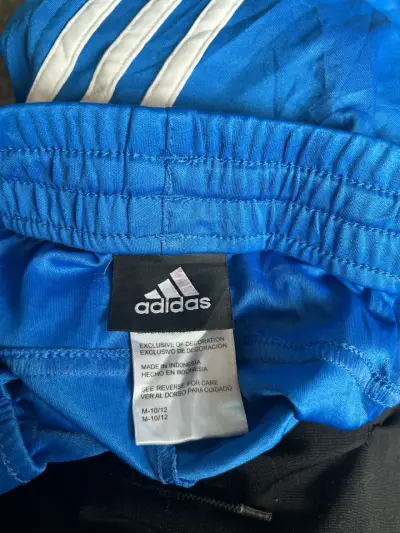 Pantalones deportivos azules Adidas con franjas - miniatura 2