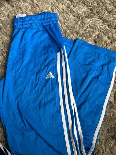 Pantalones deportivos azules Adidas con franjas - miniatura 1
